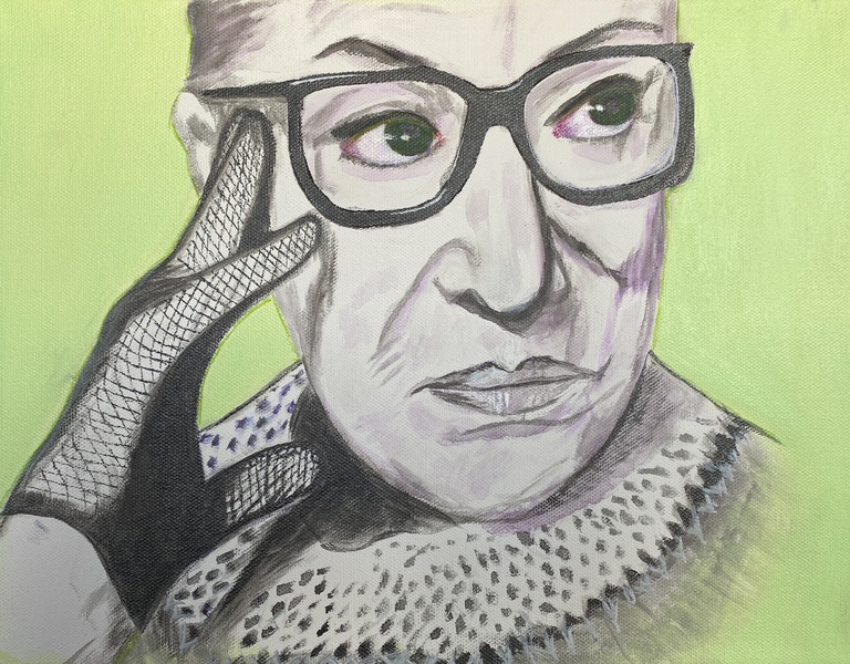  Portrait of Ruth Bader Ginsburg with dark rimmed glasses, lace gloved fingers lightly touching her face as she looks off to the right 
