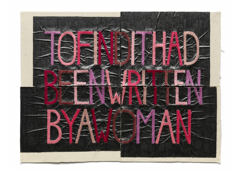  Embroidery with PINK hues on graphite that spell the words "TO FIND IT HAD BEEN WRITTEN BY A WOMAN"" 