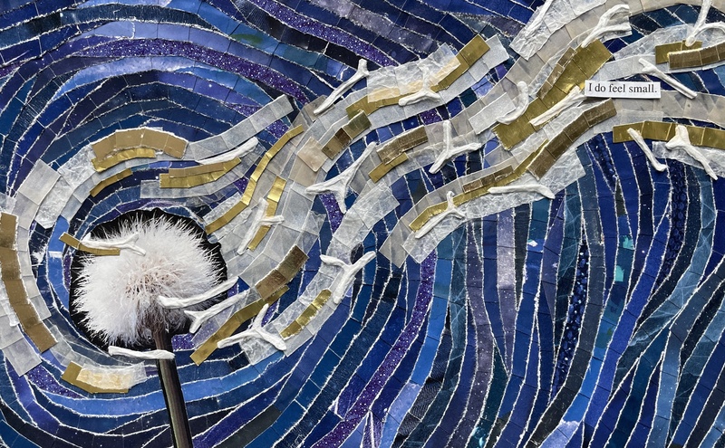  A photograph of a dandelion gone to seed is haloed by blue paper. Swirling around the dandelion white and gray paper, interspersed with gold. Small pieces of textured white paper lay over it. A small line of text reads: 'I do feel small.' 
